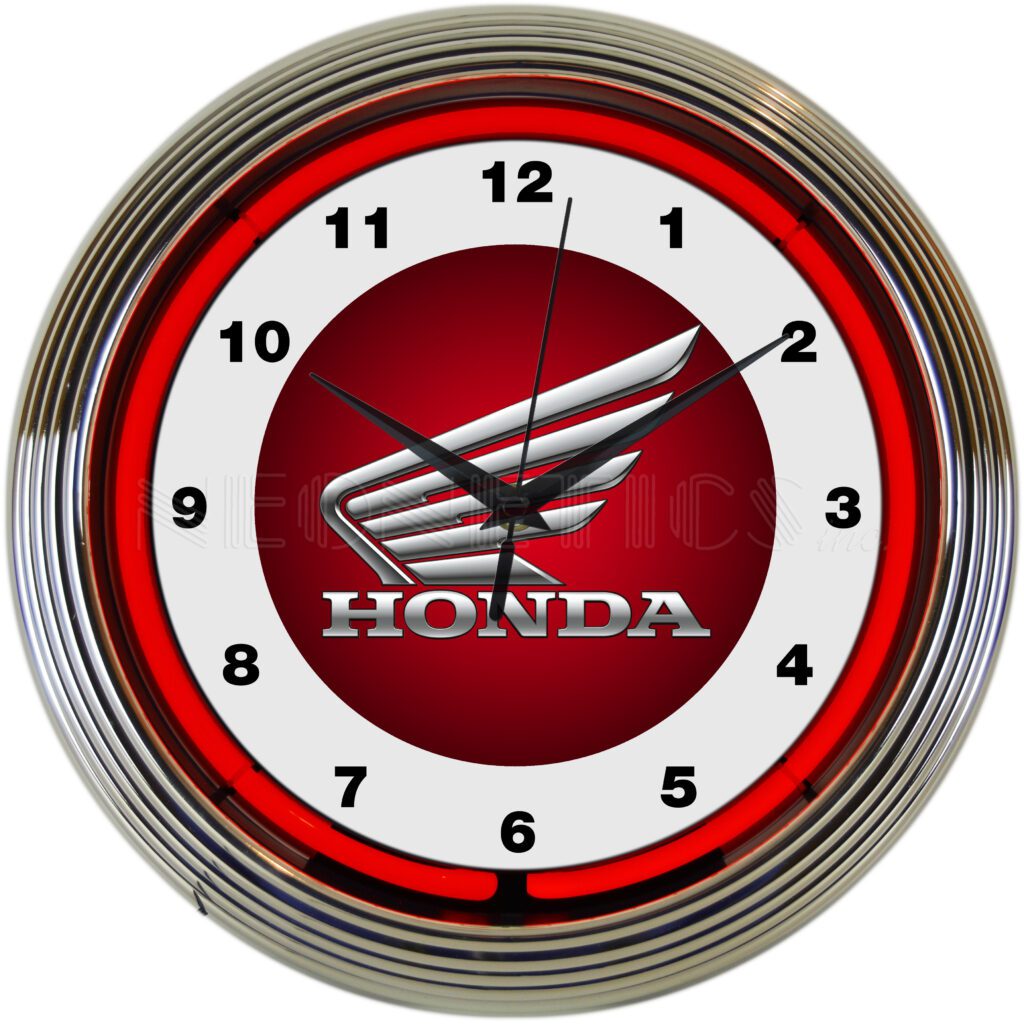 A round wall clock with the Honda logo on the face.